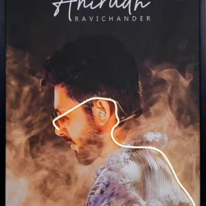 Rockstar Anirudh Portrait LED Wall Decor with smoky amber background and warm gold LED outline tracing glasses and shoulder